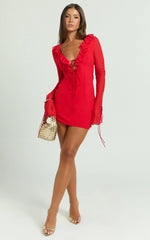 Mini-robe Alesya - Robe rouge à volants, décolleté plongeant, manches longues et détails à nouer