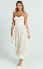 Robe longue Loretta - Robe plissée bustier avec lacets dans le dos de couleur crème