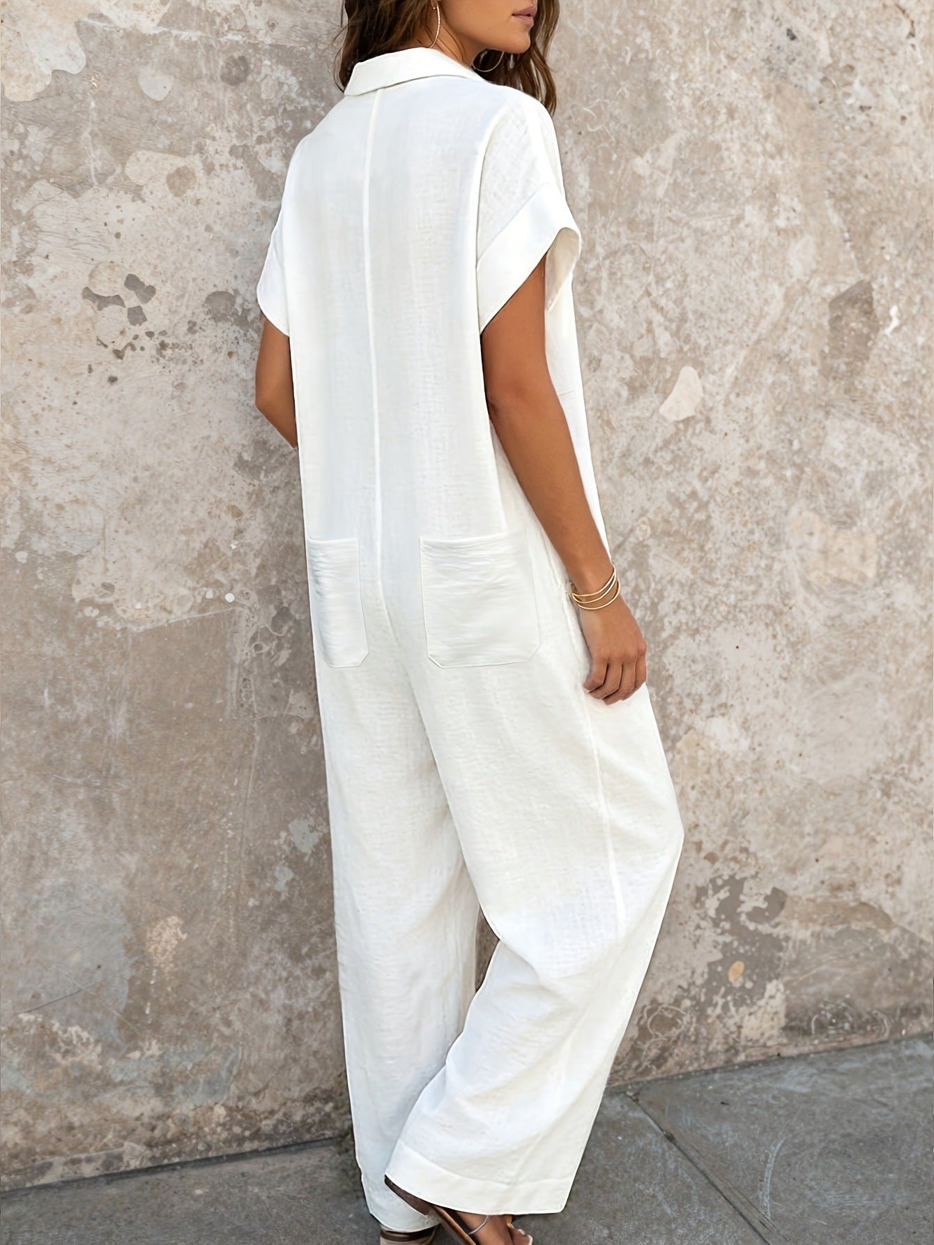 Solid-color Textured Crinkle Jumpsuit With Lapel Collar, Half-button Front, And Ankle-length Wide Legs